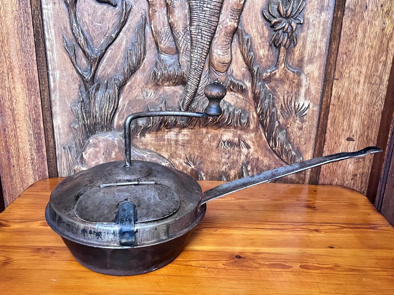 Antique French manual metal coffee roaster with hinged lid and long handle