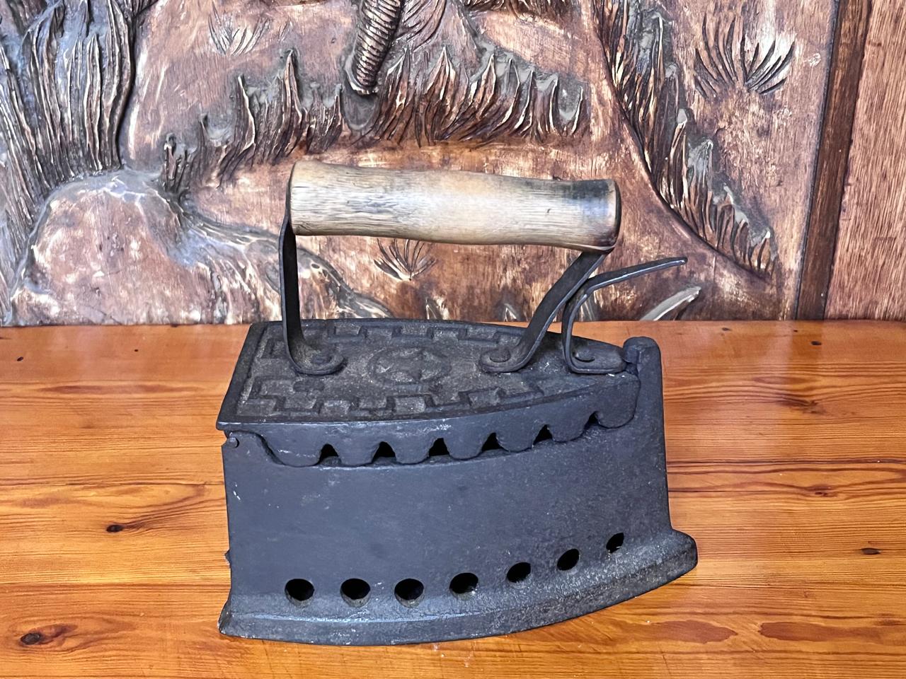 Antique cast iron charcoal sad iron with wooden handle